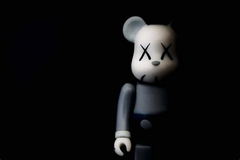 Download The Stunning Kaws Bearbrick Collection Wallpaper | Wallpapers.com