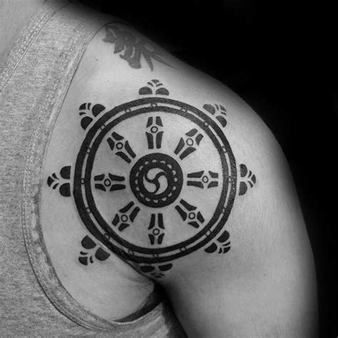 40 Dharma Wheel Tattoo Designs For Men - Dharmachakra Ink Ideas | Wheel ...