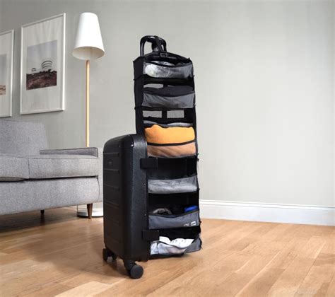 This Suitcase Has a Built-In Shelf So That Packing Is a Breeze