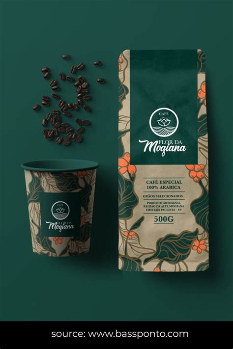 a coffee cup next to a bag of coffee beans on a green background with an orange flower