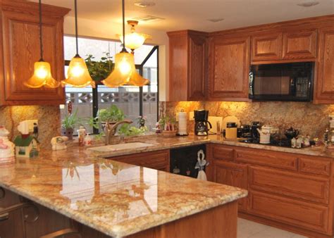 Image result for honey oak cabinets stone countertop | Kitchen remodel small, Kitchen remodel ...