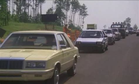 IMCDb.org: 1985 Chrysler LeBaron Turbo in "Invasion USA, 1985"