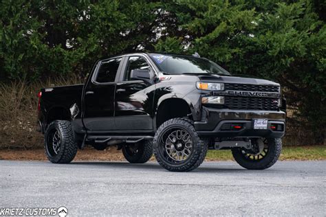 Lifted 2019 Chevy Silverado 1500 with 22×12 XD Grenade XD820 with 6 Inch Rough Country Lift Kit ...