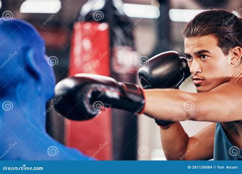 Fitness, Boxing and Man at Gym for Exercise, Training and Workout with a Dummy for Fast, Speed ...