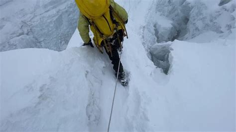 Mt. Everest 2021 Khumbu Icefall - Climbing and crevasse ladder crossing ...