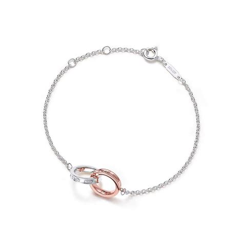 Tiffany 1837® double interlocking bracelet in silver and Rubedo® metal, mini. | Tiffany & Co ...