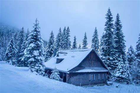 Village in snowy mountains stock photo. Image of savoie - 26876704