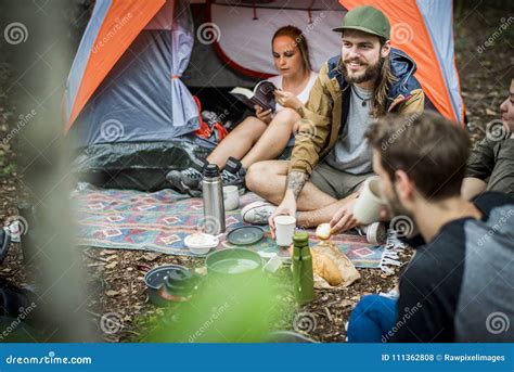 Friends Camping in the Forest Together Stock Photo - Image of cheerful ...