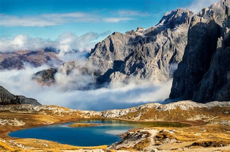 Premium Photo | Laghi del piani lakes view and huge rocky mountains in ...