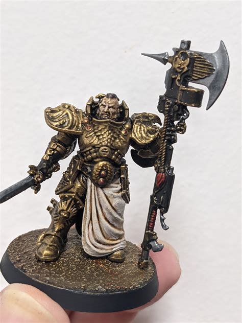 First time painting a Custodes. Shield Captain done in a slightly more gritty style. Not too bad ...