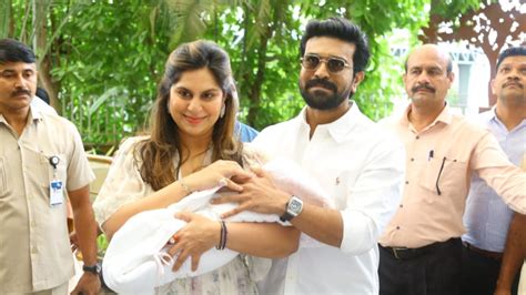 Ram Charan And Upasana Make First Appearance With Daughter In Hyderabad ...