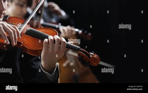 Classical music. Violinists in concert Stock Photo - Alamy