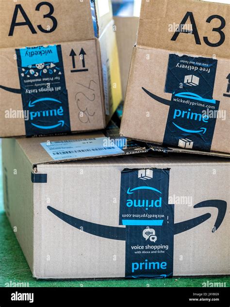 Opened Amazon Prime boxes on a front porch Stock Photo - Alamy