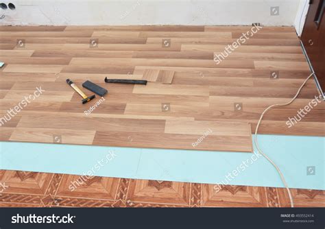 Installing Wooden Laminate Flooring Stock Photo 493552414 | Shutterstock