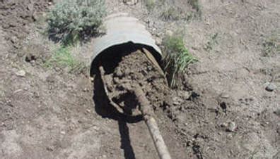 How to unclog a culvert pipe - Country Roads Paving, LLC.