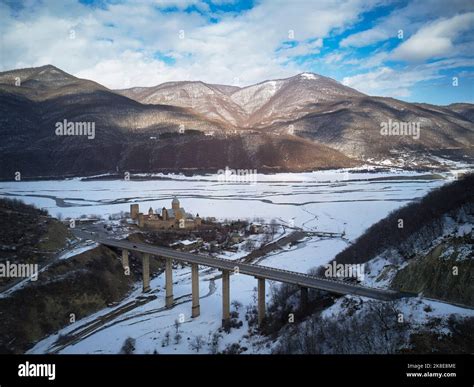 Ananuricastle complex on the Aragvi River in Georgia next to viaduct ...