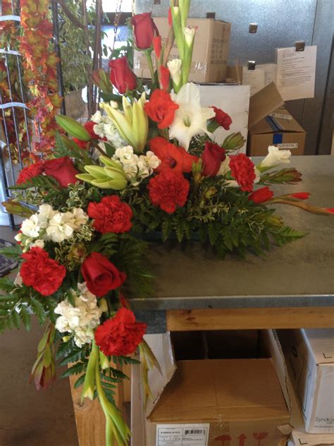 Red and whites to go around cremation box. Crystal Rose Florist Folsom CA | Funeral floral ...