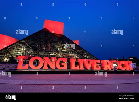 The night view of Rock and Roll Hall of Fame designed by architect I.M.Pei. with Long Live Rock ...