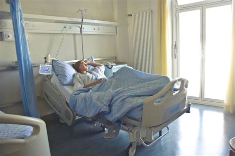 Photo of Woman Lying in Hospital Bed · Free Stock Photo