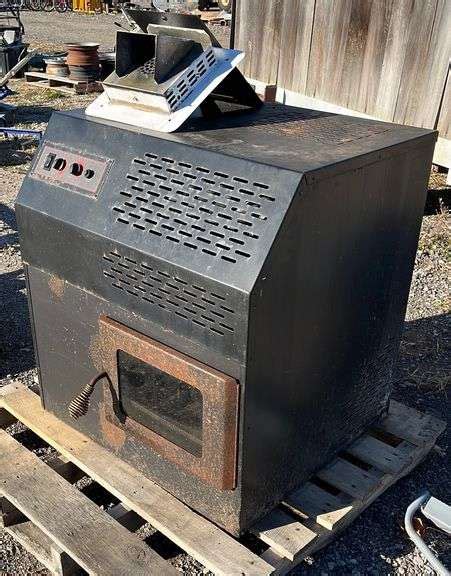 70,000 BTU corn stove with combustion air intake and exhaust fixture ...