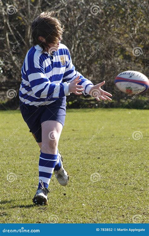 A Youth Rugby Player Passing A Rugby Ball !! Stock Photography - Image ...