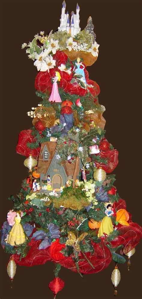 Royal Princess Christmas Tree decorated to includes the famous princesses an… | Disney christmas ...