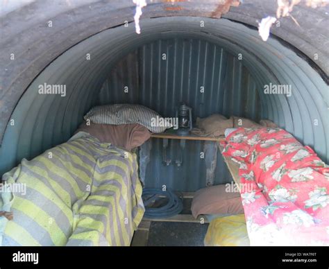 Interior view of an Anderson Shelter with sleeping bags for family ...