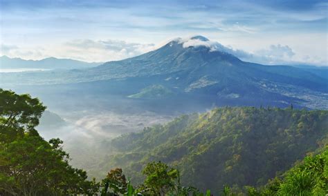 Mount Batur is an active volcano at the center of two concentric calderas to the northwest of ...