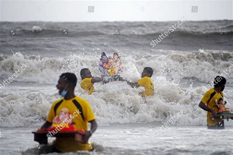 volunteer carries idol Hindu god Ganesh immersion Editorial Stock Photo - Stock Image | Shutterstock