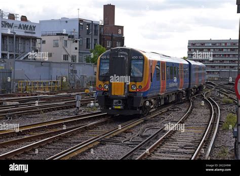 South Western Railway Siemens Desiro class 450 electric trains leaving Waterloo Station, London ...