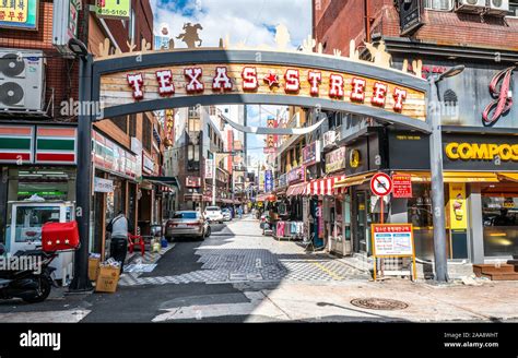 Busan Korea , 3 October 2019 : Texas bars street view with entrance sign in Busan South Korea ...