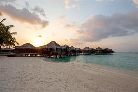 Maldives Over Water Bungalows Sunset / Sunrise Stock Photo - Image of ...