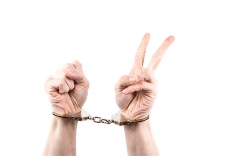 Hands In Handcuffs Free Stock Photo - Public Domain Pictures