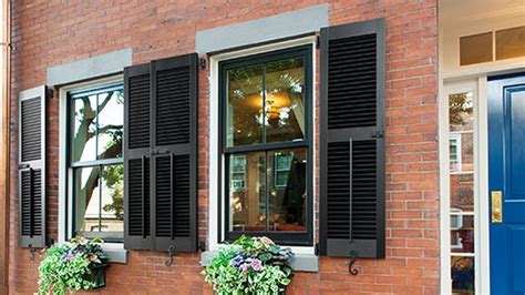 Brick with Black Shutters: The Perfect Combination for a Striking Home Exterior - Click Here to See!