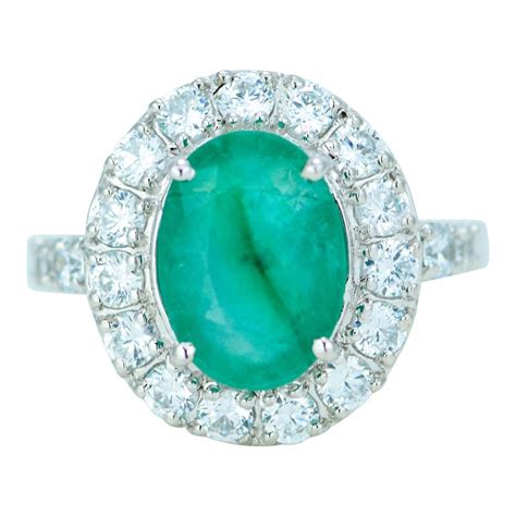 Natural Emerald Halo Ring For Sale at 1stDibs