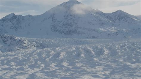 4K stock footage aerial video zoom out revealing snow covered Knik ...