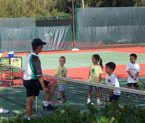 Tennis Lessons - AM Stringing