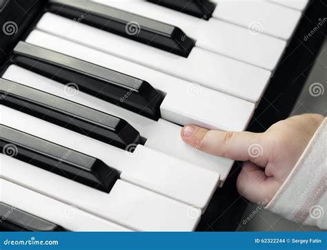 Closeup Baby Hand Playing Piano Stock Photo - Image of finger, clicks ...