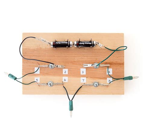 Build a simple circuit board and easily connect small holiday lights in a variety of ways to ...