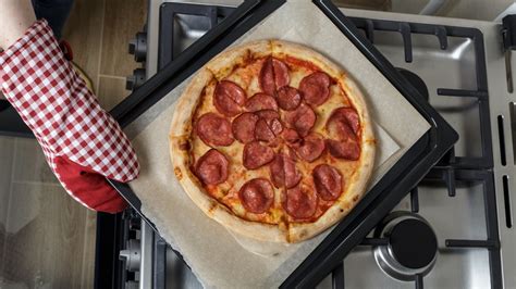 The Trick To Cooking 2 Frozen Pizzas On 1 Baking Sheet