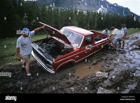 Pickup Truck Stuck in the mud Stock Photo - Alamy