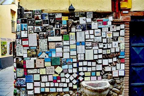 A piece of wall in Albenga/Liguria with many metal signs | Flickr