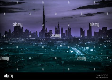 Dubai skyline at sunset Stock Photo - Alamy