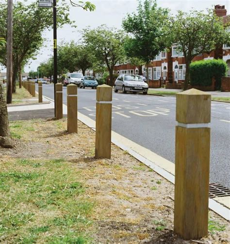 Control car parking with road side wooden bollards | Woodcraft UK