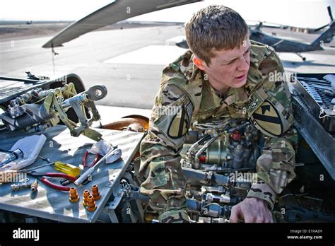 U.S. Army Sgt. Corey Christensen, a UH-60 Black Hawk helicopter crew ...