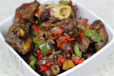 Asun (Spicy Goat Meat) is one of the numerous tongues wagging Nigerian ...