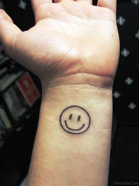 24 Wonderful Smile Wrist Tattoos