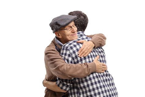 Elderly man and a young man hugging each other – Schadock