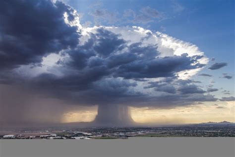 Spectacular photos of a powerful microburst storm hovering above ...