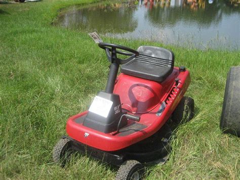 MURRAY 30" CUT RIDING MOWER - J.M. Wood Auction Company, Inc.